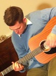 James playing guitar