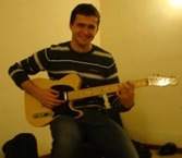 Aitor playing guitar
