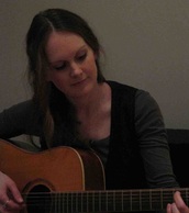 Kristina playing guitar