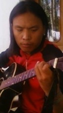 Akash playing guitar